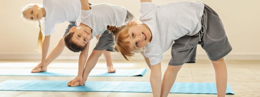 toddlers doing yoga