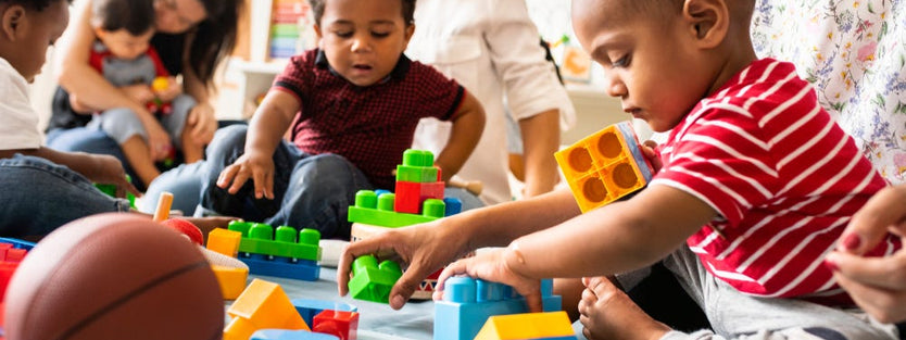 toddlers playing with parents