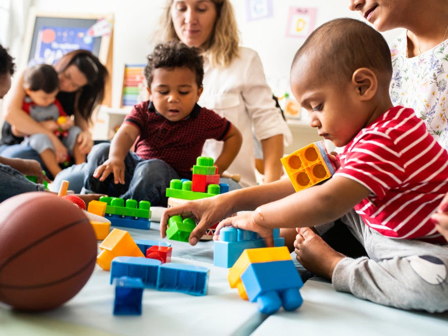 toddlers playing with parents