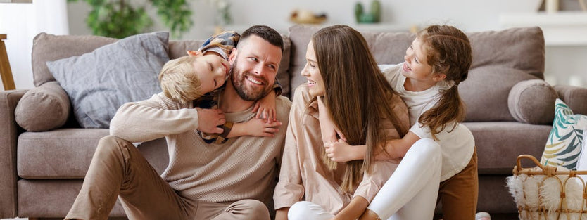 child hugging mum and dad