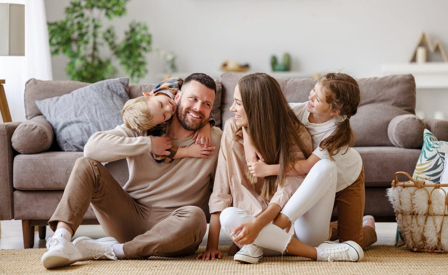 child hugging mum and dad