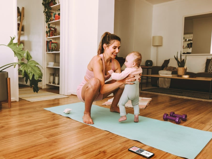 mum and daughter exercising