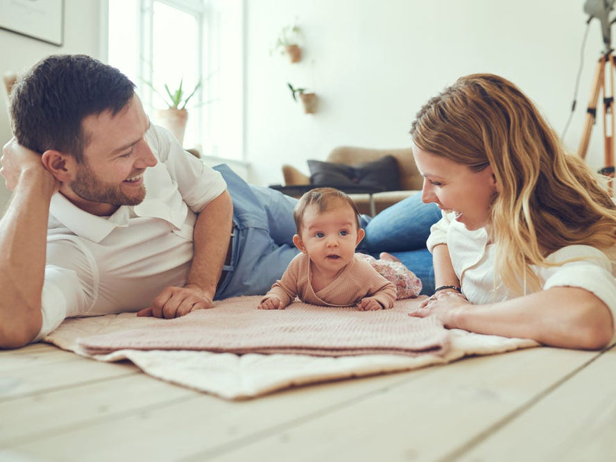 parents on floor with kids