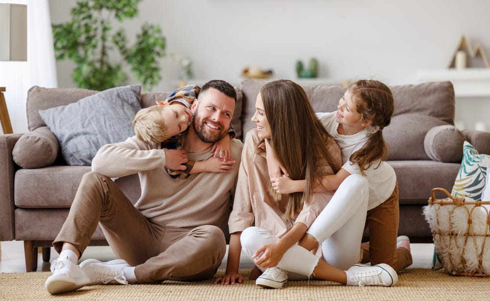 child hugging mum and dad