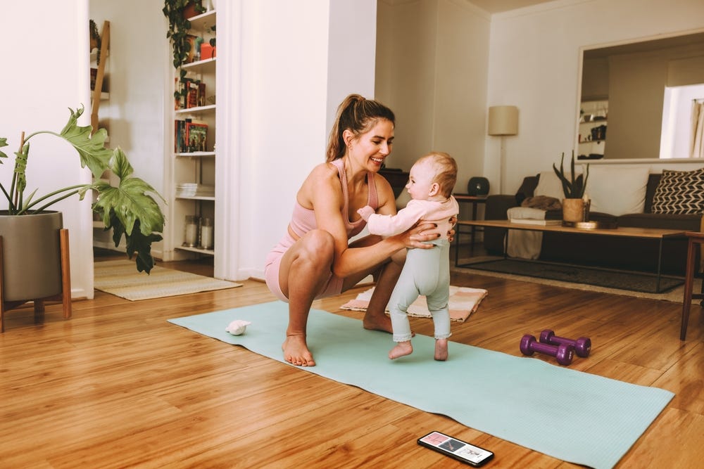 mum and daughter exercising